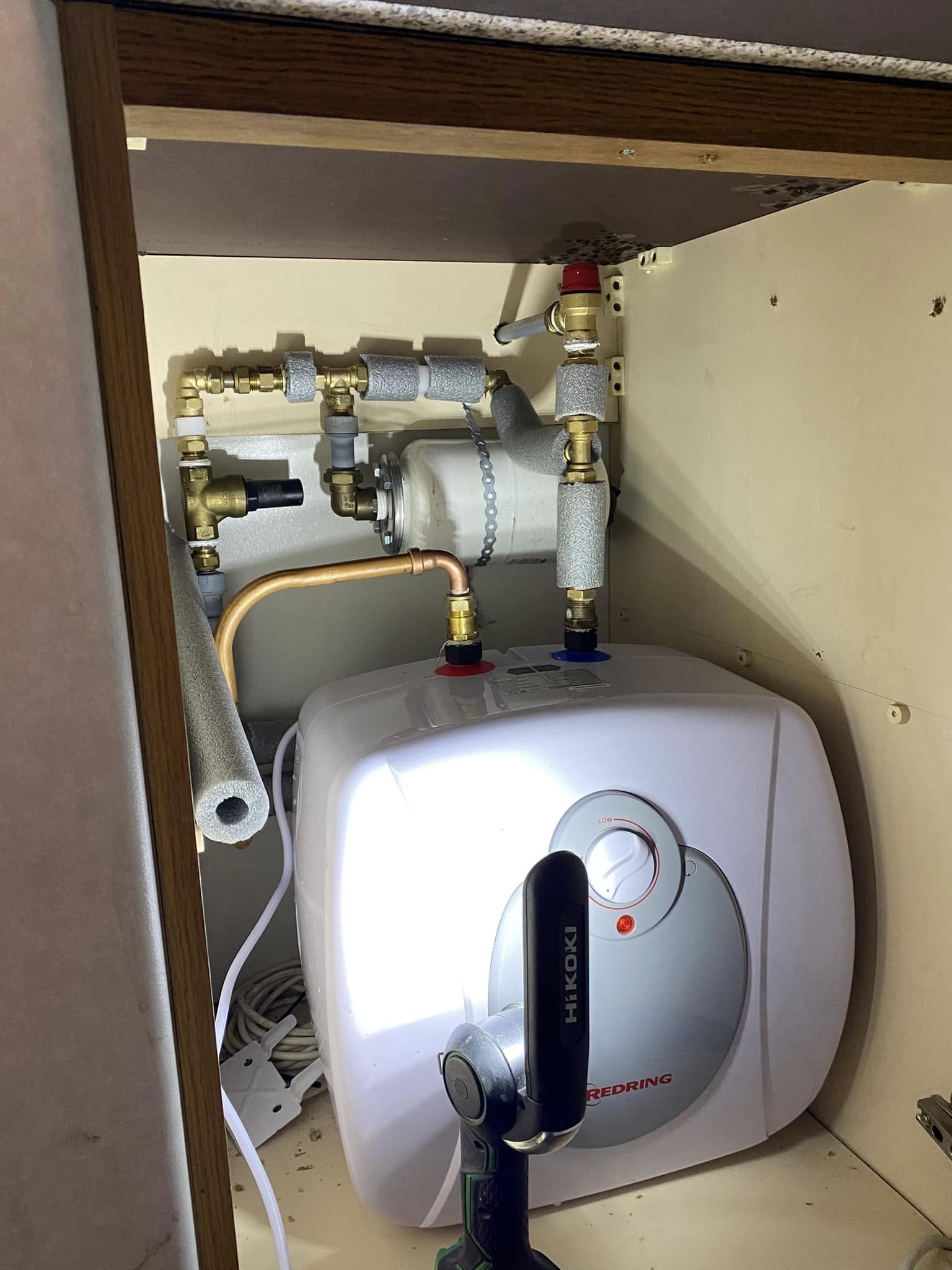 Undersink water heater installation